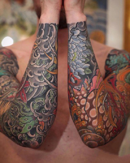 点击大图看下一张：传统纹身图案 27组传统风格的包臂手臂纹身作品图案