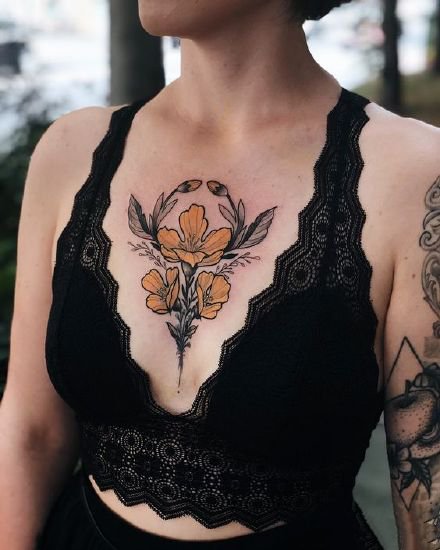 点击大图看下一张：胸部花卉纹身 oldschool风格的9组花胸纹身图案