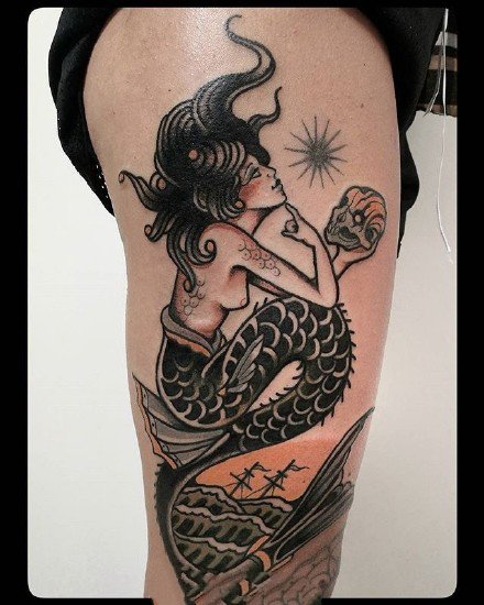 点击大图看下一张：9张美人鱼主题的纹身作品图片