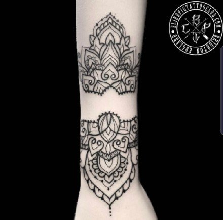 点击大图看下一张：图腾梵花纹身 一组黑色的曼陀罗梵花图腾纹身图案
