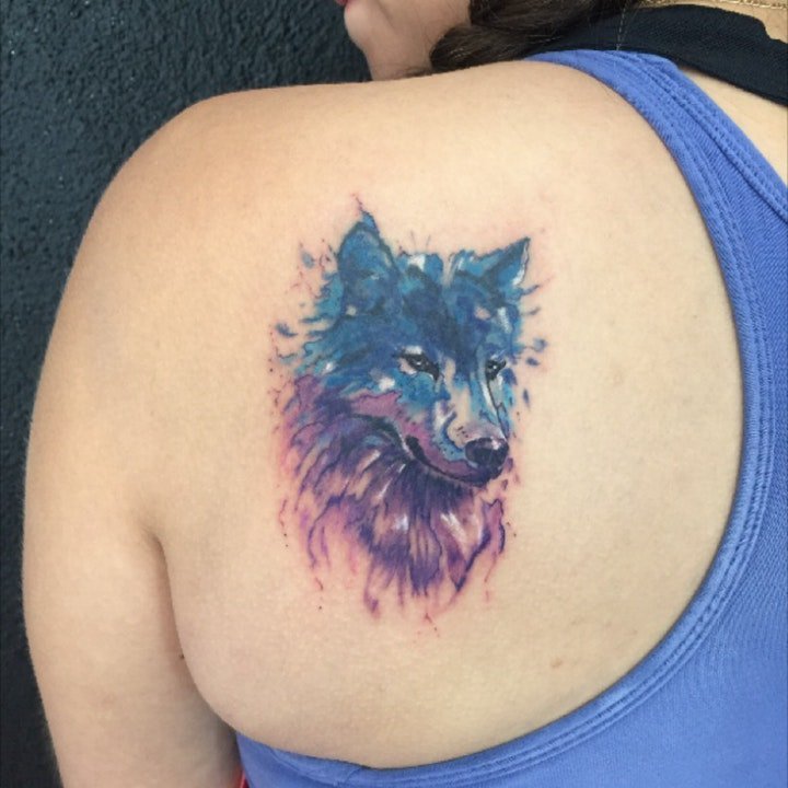 点击大图看下一张：狼的纹身图案   技巧与创意并存的狼纹身图案