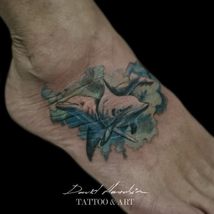 点击大图看下一张：纹身海豚  9款活泼伶俐的海豚纹身图案