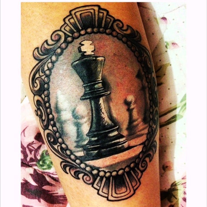 点击大图看下一张：纹身有趣的图案  技艺精湛的棋类纹身图案