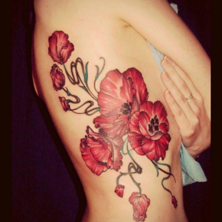 点击大图看下一张：罂粟花纹身  9张妖艳迷人而又魅惑人心的罂粟花纹身图案