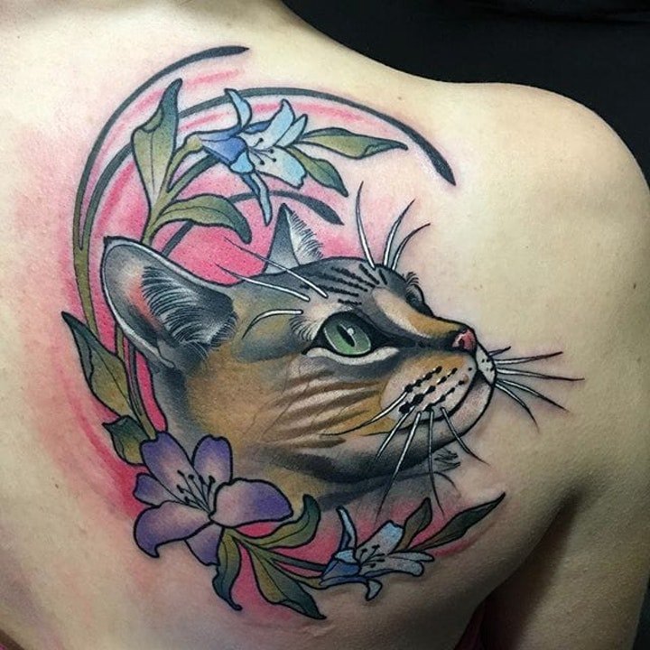 点击大图看下一张：猫的纹身图案   慵懒而又机灵的动物猫纹身图案