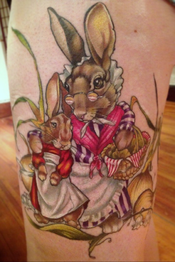 点击大图看下一张：可爱兔子纹身  温顺乖巧的可爱兔子纹身图案