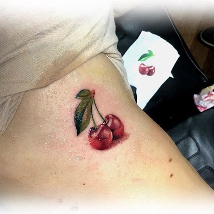 点击大图看下一张：樱桃纹身图案  甜浓美味的樱桃纹身图案9张