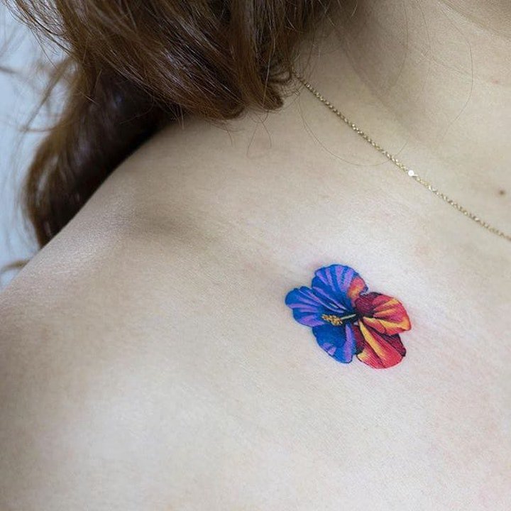 点击大图看下一张：纹身图花朵  清秀而又不失秀丽的花朵纹身图案