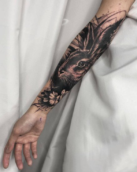 点击大图看下一张：黑臂纹身 帅气的9组深黑色系的手臂纹身图案