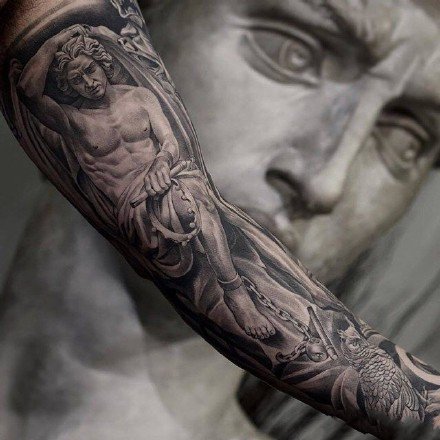 点击大图看下一张：欧美宗教主题的一组包大臂写实纹身图片