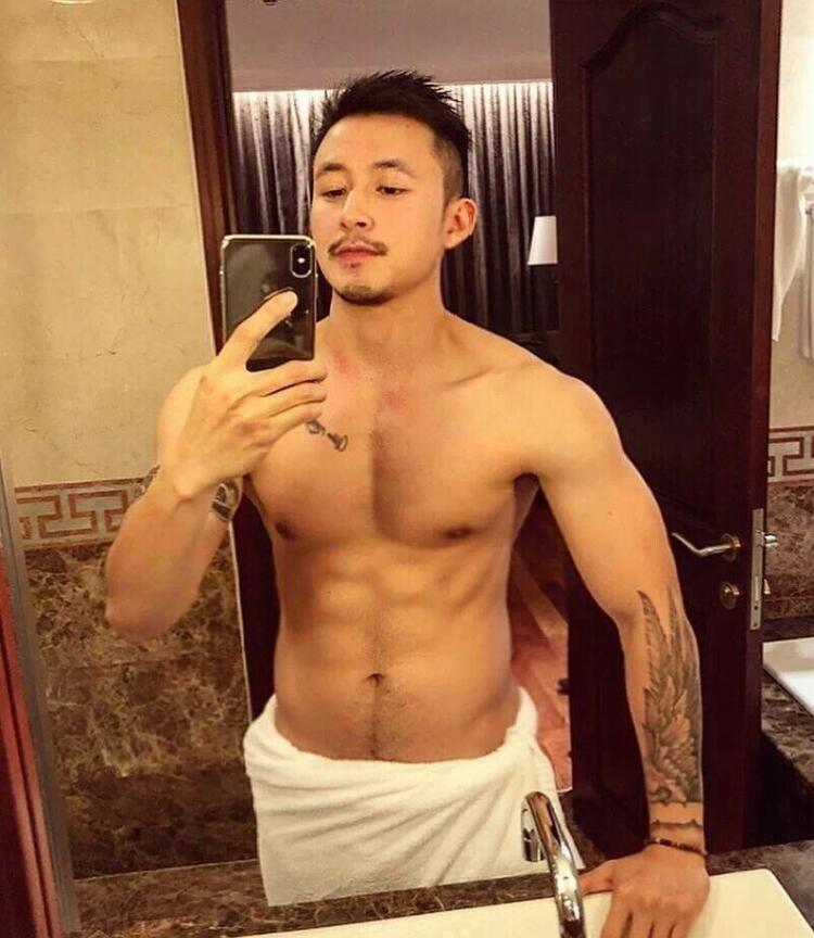 点击大图看下一张：性感肌肉纹身中国帅哥照片