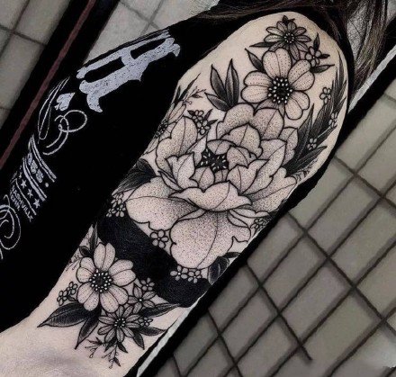 点击大图看下一张：一组精品花卉组图点刺纹身作品