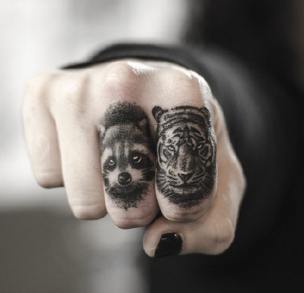 点击大图看下一张：个性的9款手指上的纹身艺术图片
