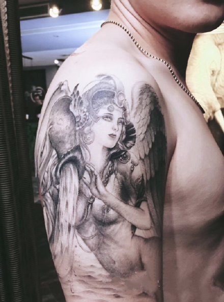 点击大图看下一张：带翼天使纹身 9张带翅膀的天使纹身图案