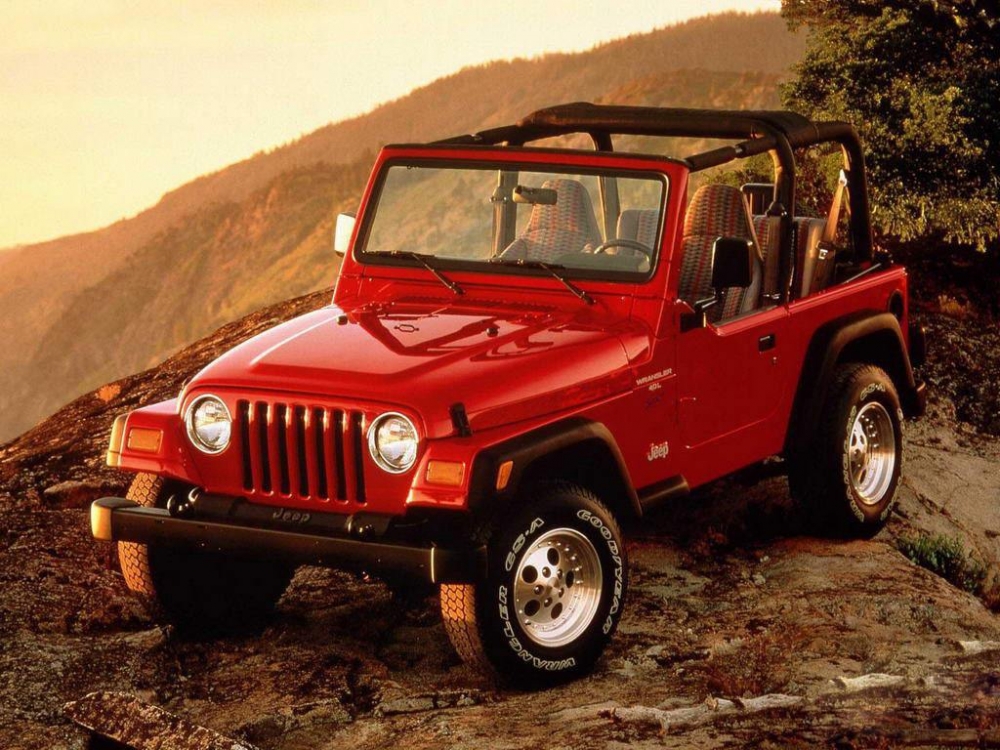 点击大图看下一张：一组红色酷炫的jeep牧马人汽车图片