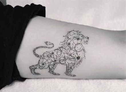 点击大图看下一张：9款适合狮子座的小狮子纹身图片