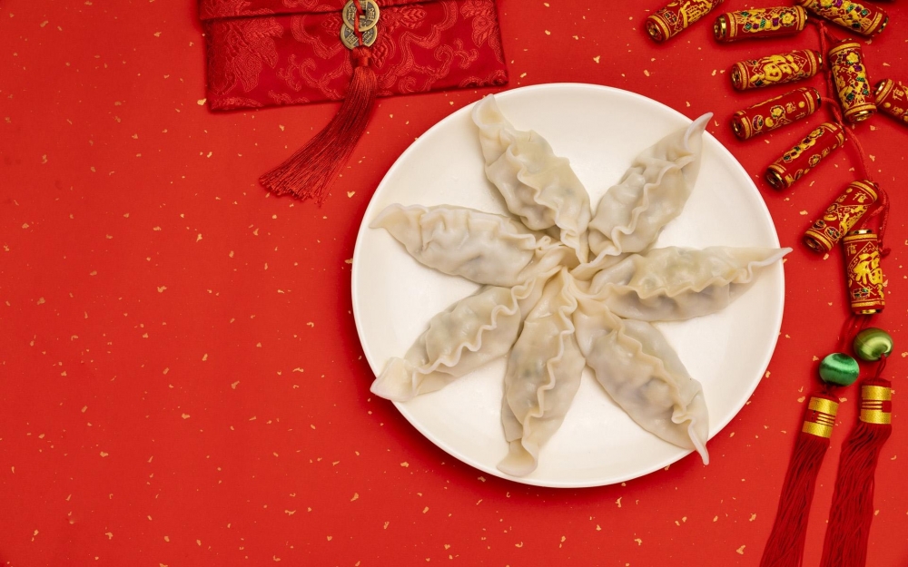 点击大图看下一张：春节传统美食饺子图片