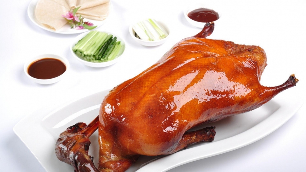 点击大图看下一张：肉质细腻的北京烤鸭图片