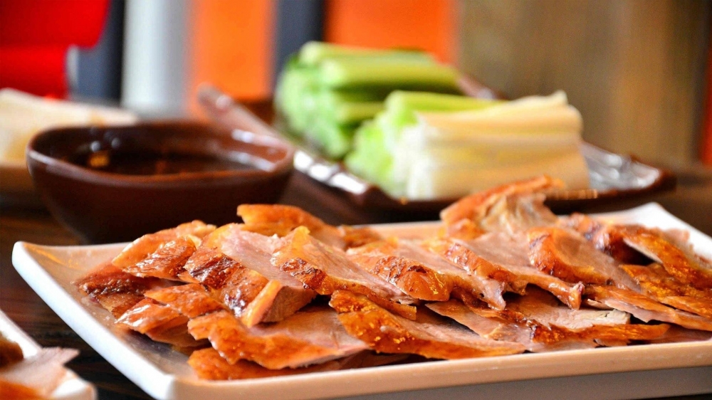 点击大图看下一张：肉质细腻的北京烤鸭图片
