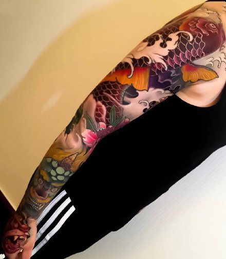 点击大图看下一张：大花臂纹身  18款传统等风格的花臂纹身作品图案