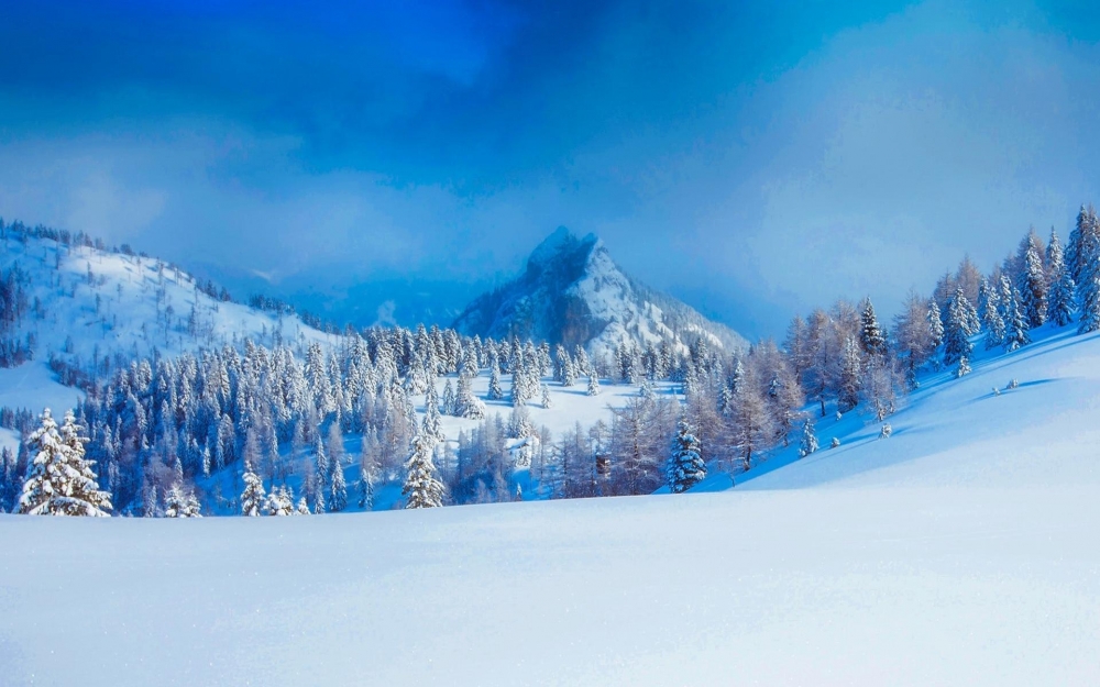 点击大图看下一张：优美的山脉雪景图片桌面壁纸