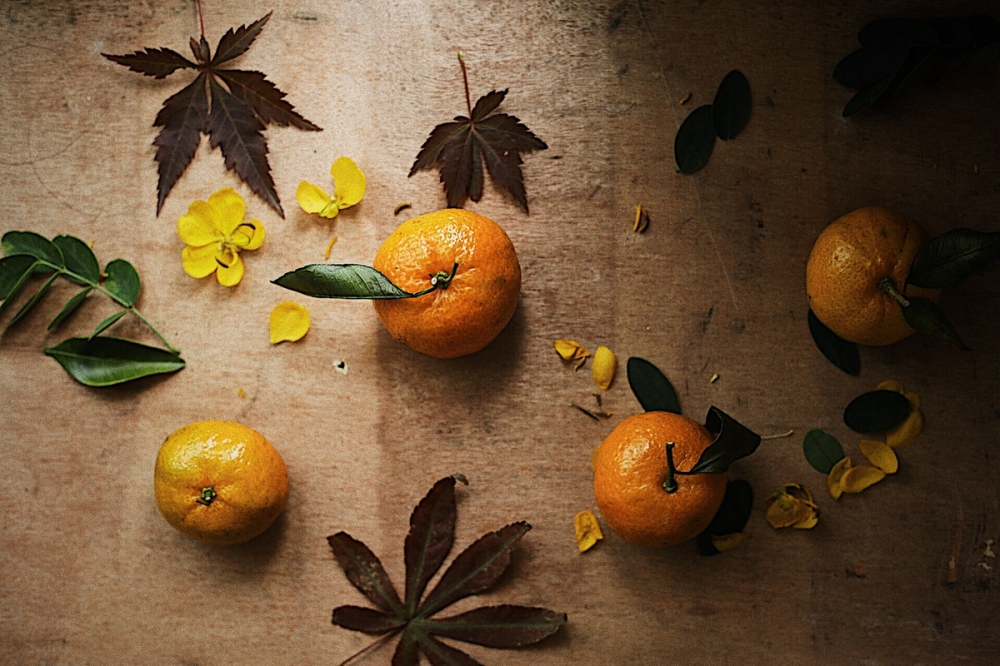 点击大图看下一张：黄色橘子做艺术品的摄影图片