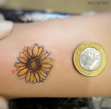 点击大图看下一张：向阳花纹身 一组向日葵主题的花朵纹身图片