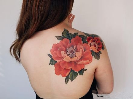 点击大图看下一张：传统风格的9款女性花卉系列纹身图片