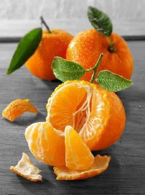 点击大图看下一张：橘子图片_剥开的橘子肉图片欣赏