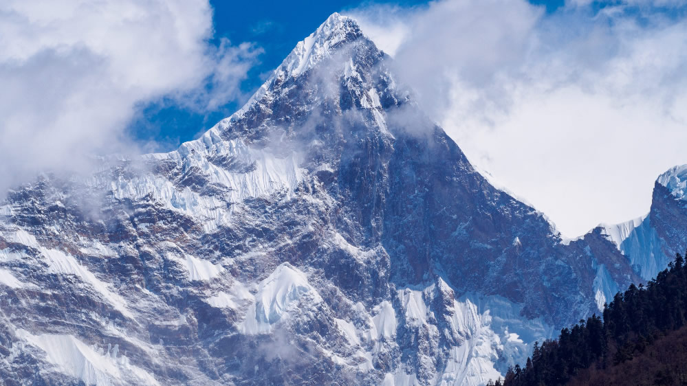 点击大图看下一张：西藏林芝雪山图片