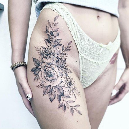 点击大图看下一张：女生大腿素花纹身 18款性感女神的大腿素花纹身图案