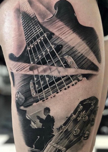 点击大图看下一张：乐器纹身 9款吉他架子鼓等乐器主题的纹身图案