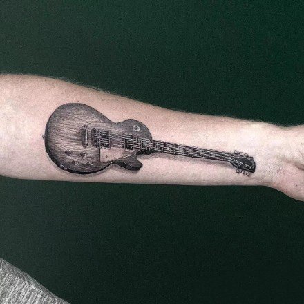 点击大图看下一张：水彩吉他纹身 水彩色的9款小清新吉他纹身图片