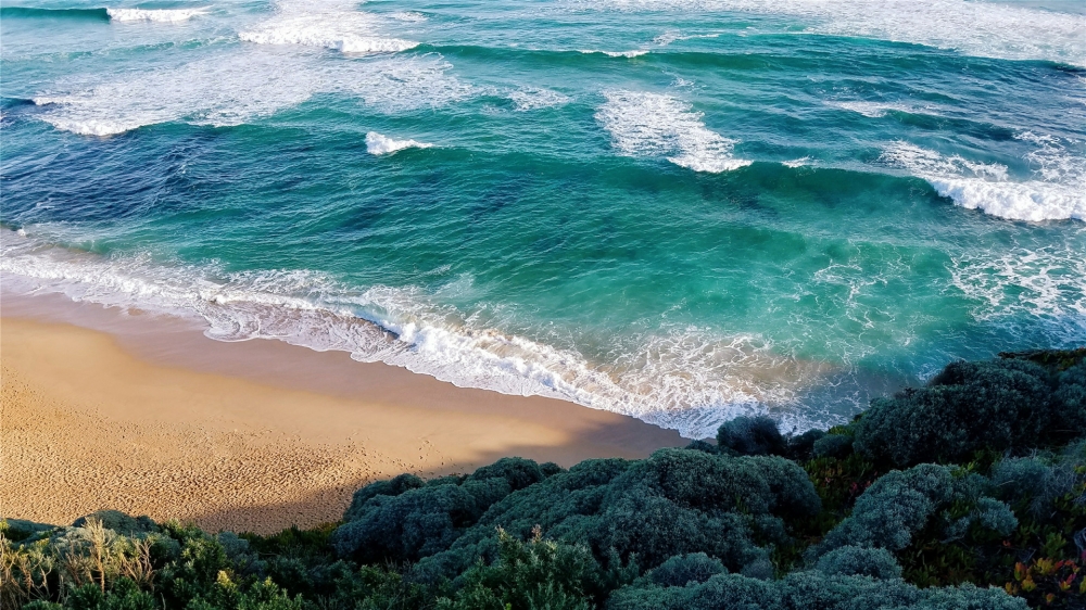 点击大图看下一张：唯美海洋沙滩高清桌面壁纸