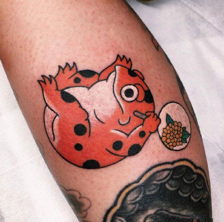 点击大图看下一张：日式可爱的9款青蛙纹身图片