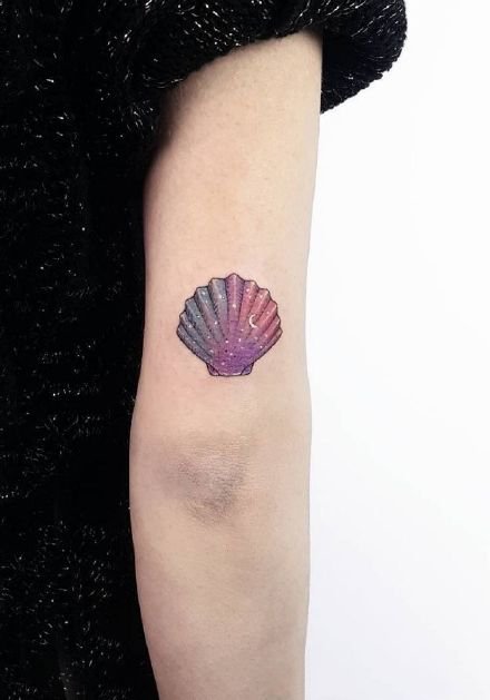 点击大图看下一张：夏日小清新的9款贝壳纹身作品