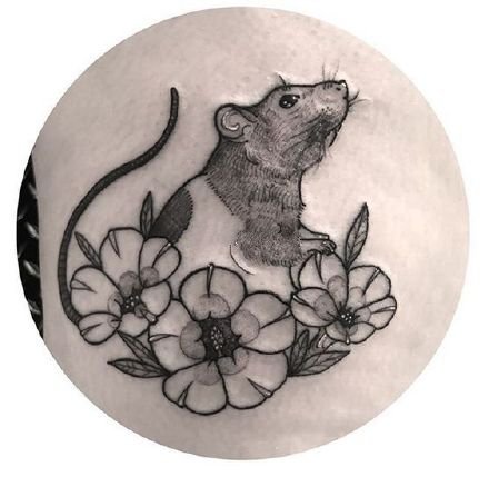 点击大图看下一张：适合属鼠人的几款老鼠小纹身作品