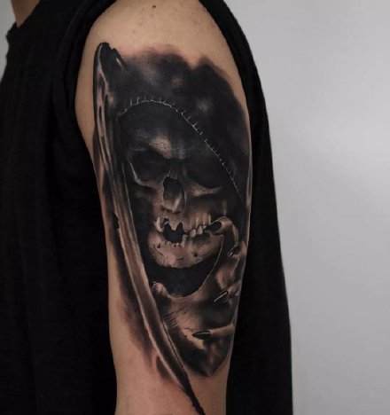 点击大图看下一张：死神纹身主题的14款骷髅死神创意纹身作品