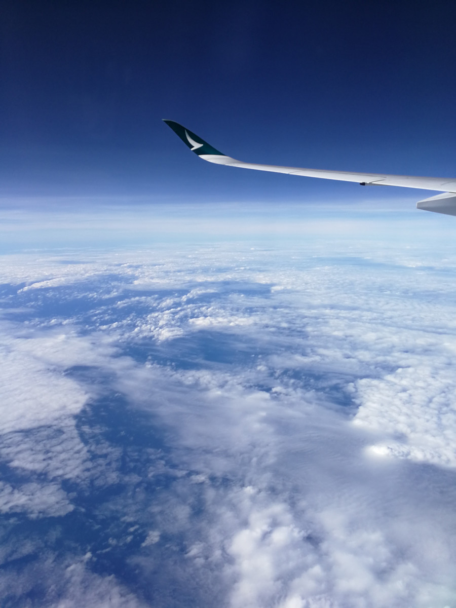 点击大图看下一张：飞机上拍摄的蓝天白云图片