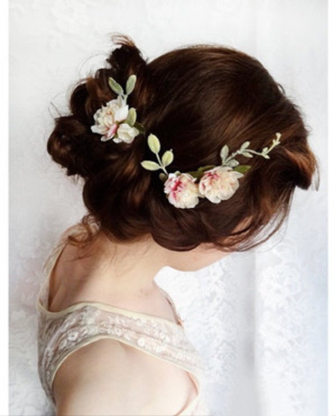 点击大图看下一张：几款漂亮的新娘发型推荐