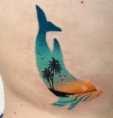 点击大图看下一张：精美好看的9款海豚小纹身图案