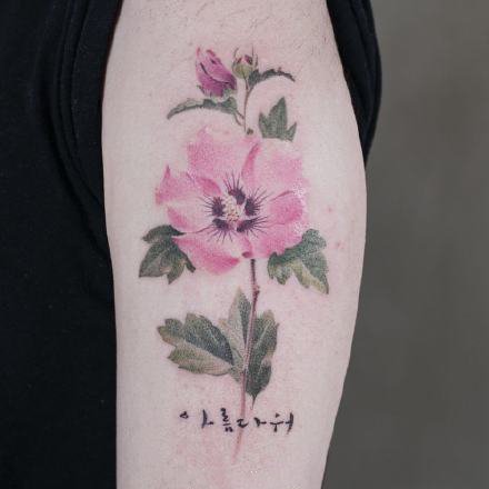 点击大图看下一张：一组水彩花朵纹身图案欣赏