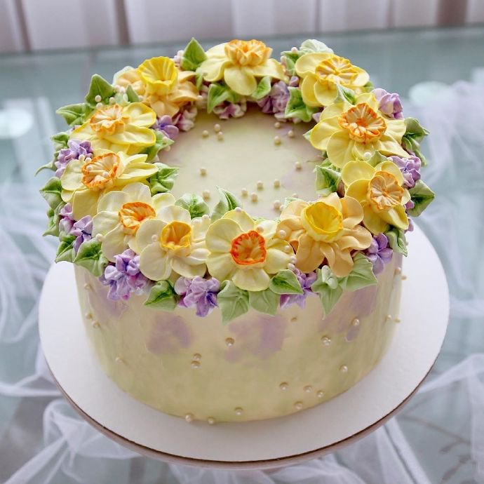 点击大图看下一张：充满春天气息的花朵蛋糕图片