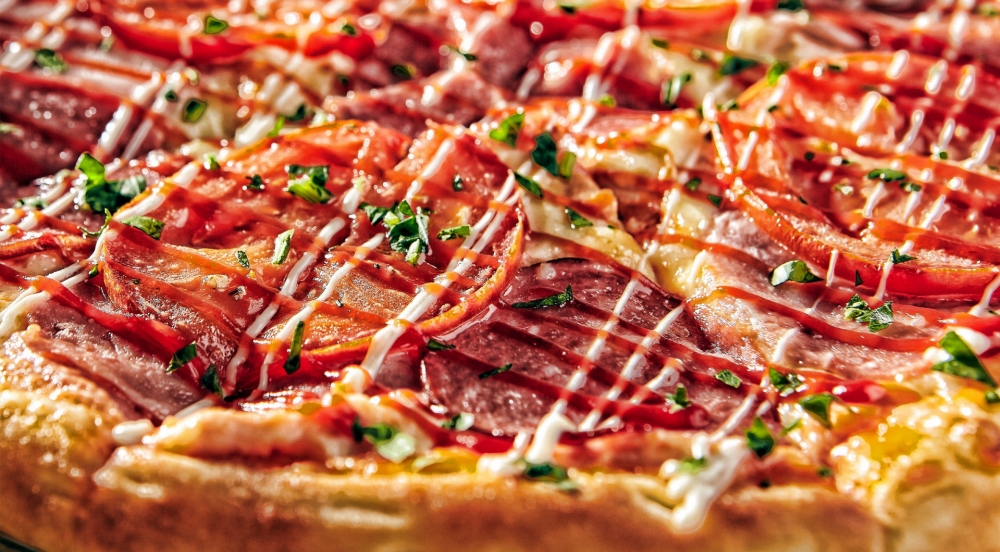 点击大图看下一张：一组秀色可餐的披萨图片
