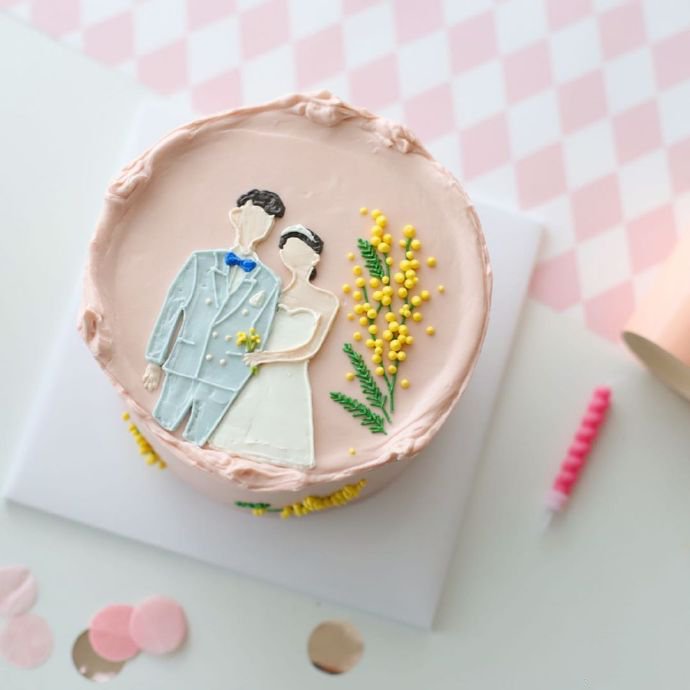 点击大图看下一张：与爱有关的情侣蛋糕图片