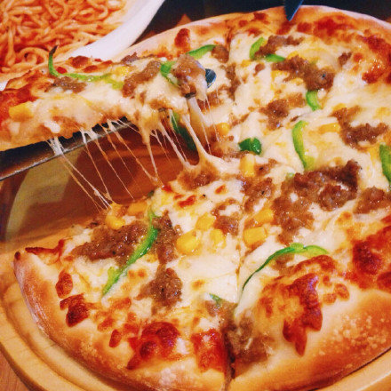 点击大图看下一张：美味的芝士拉丝披萨 ​​​​