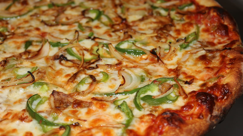 点击大图看下一张：精致美味的披萨图片
