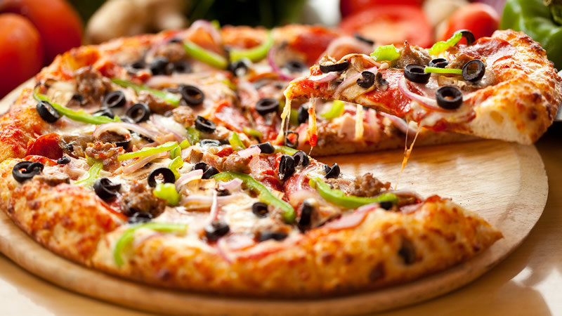 点击大图看下一张：精致美味的披萨图片