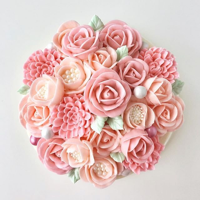 点击大图看下一张：一组美美的花朵蛋糕图片