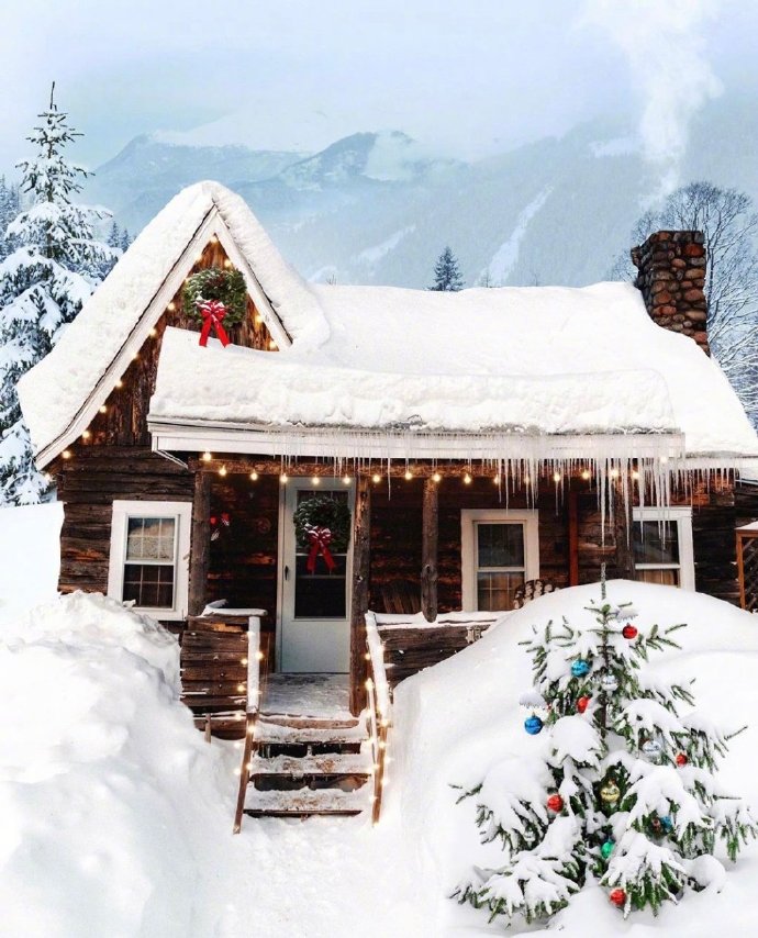 点击大图看下一张：雪中木屋，严寒中让人顿生暖意